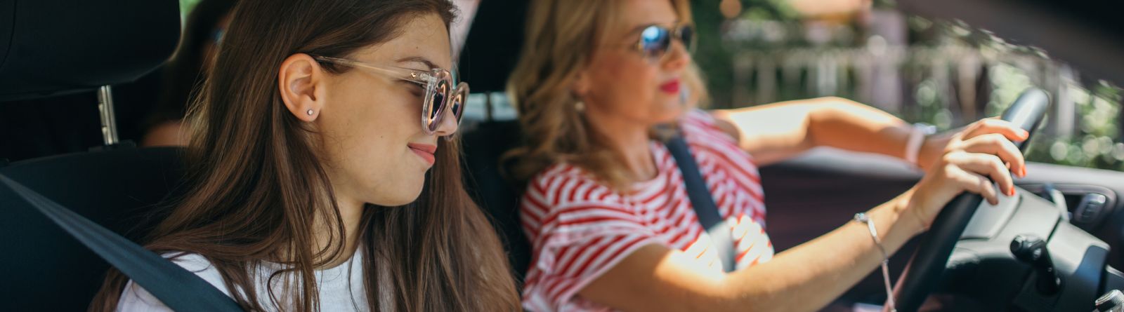 Mom with daughter in car