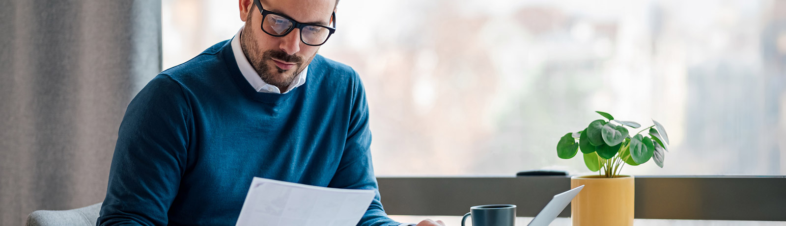 Business man looking at document