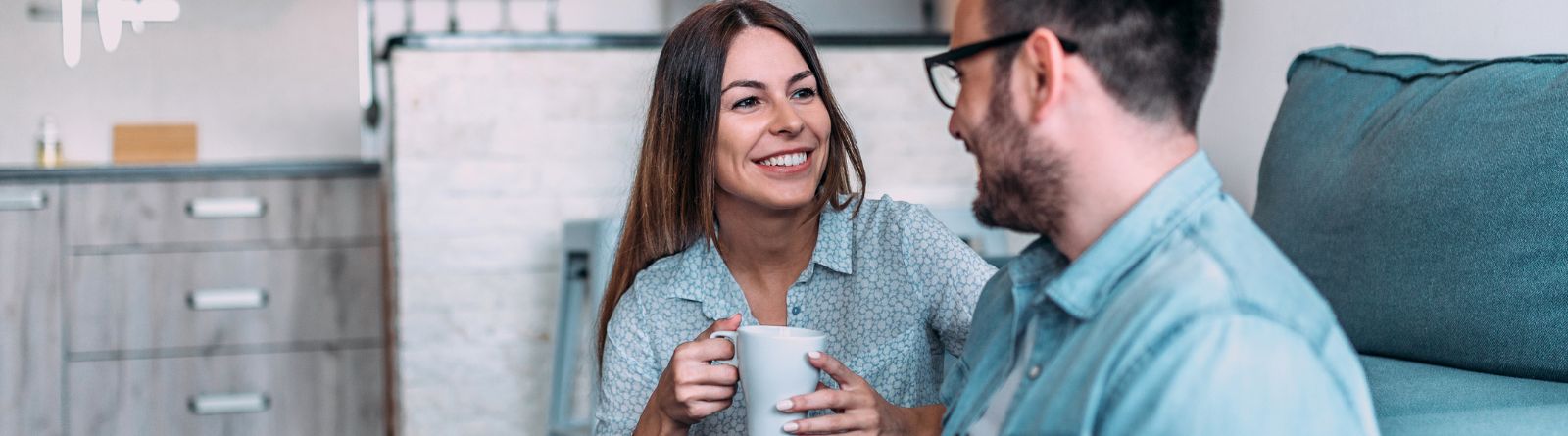 A couple sitting on the couch